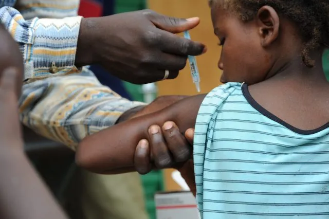 A Child receiving the MenAfriVac shot in Burkina
