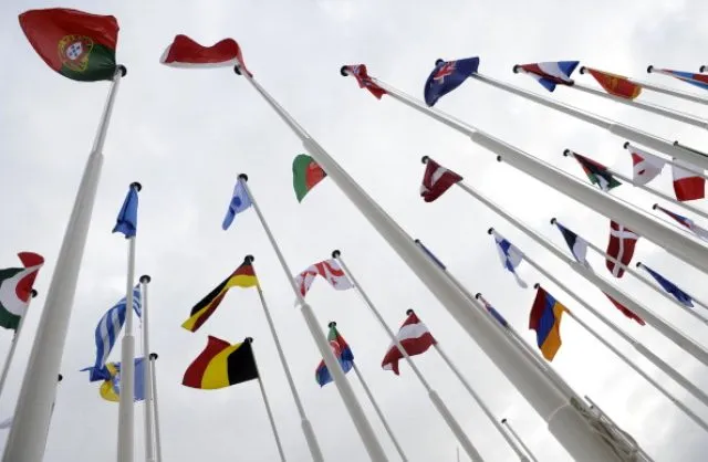Numerous flag poles with international flags