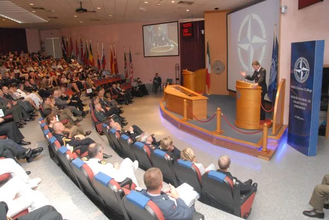 People listening to a NATO Learning conference