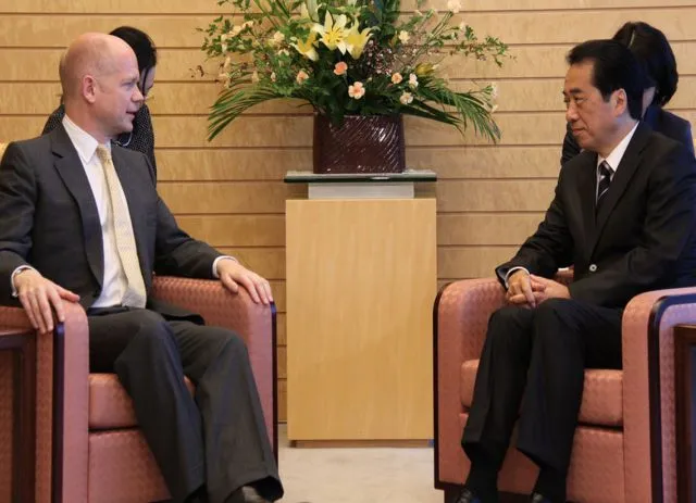 William Hague sat talking to a Japanese Ambassador