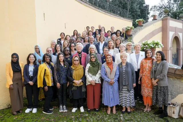 Participants at our event launching a new climate action network led by women of faith stand together for a group photo.